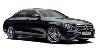 Sleek Mercedes-Benz E-Class chauffeur-driven car, offering luxury, comfort, and smooth travel